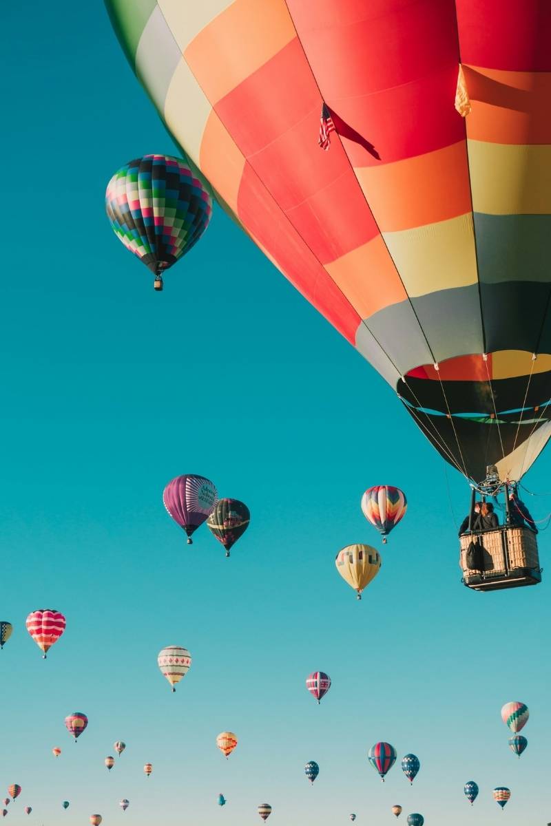Hot air balloons over Albuquerque at sunrise